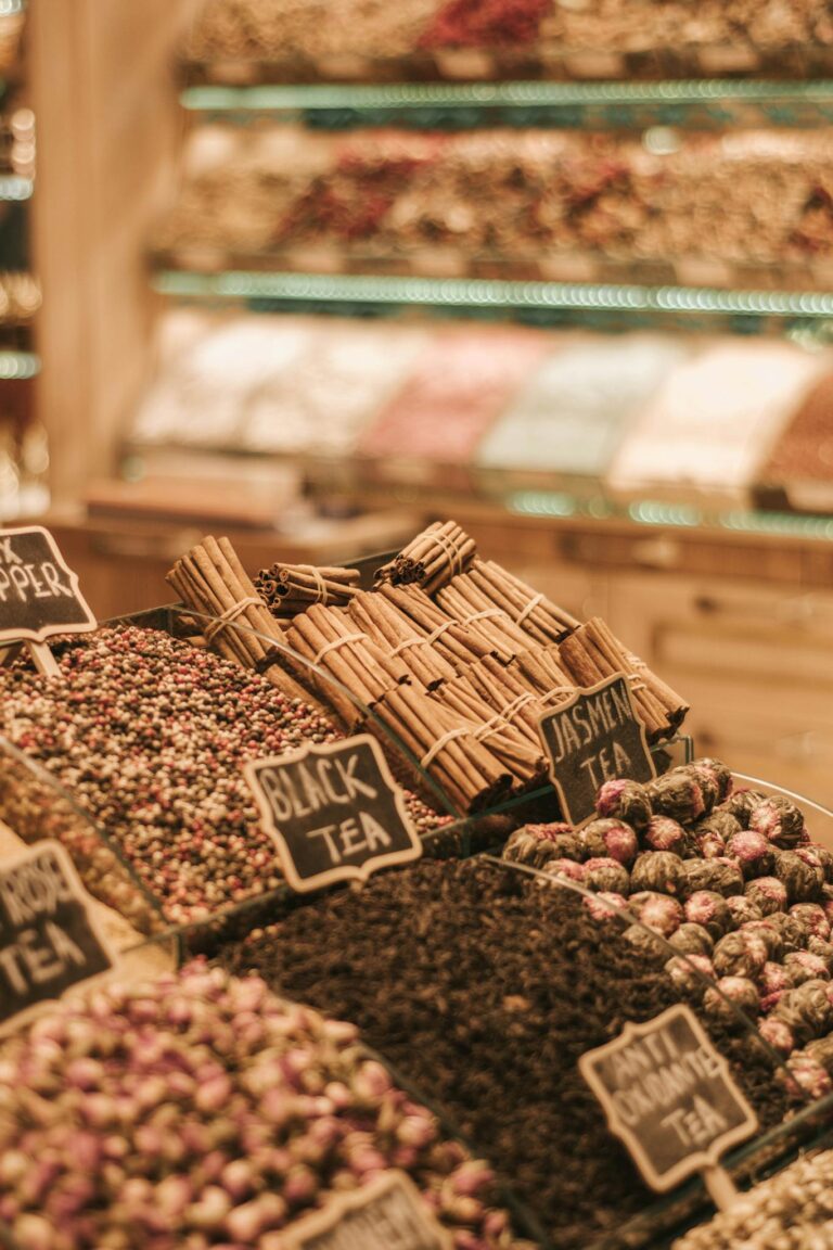 Close-up of tea and spice variety displayed in a market store.